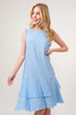 Jade Icarus washed fringe tiered dress with layered fabric and fringe details, styled with a relaxed, bohemian look.
