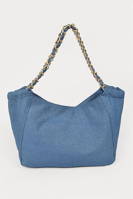 Jade Icarus denim fashion tote bag with sturdy handles and spacious interior, perfect for casual everyday use.