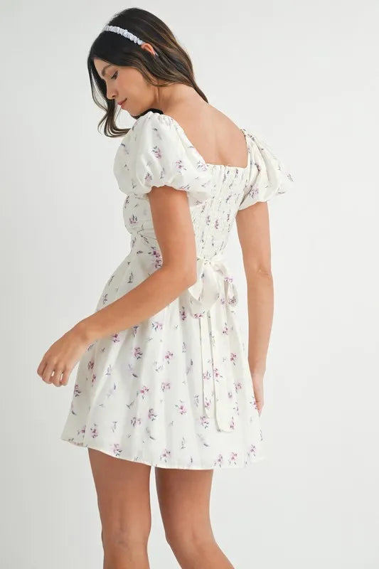 Pear Daisy MABLE floral print puff sleeve mini dress, stylish home and garden-inspired fashion, featuring a vibrant pattern and puff sleeves.