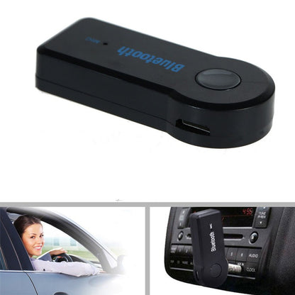 Fuchsia Molly HiFi Bluetooth music receiver connected to audio equipment, compact wireless audio and video adapter.