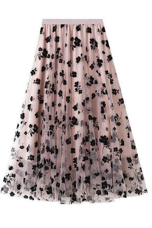 Floral chiffon midi skirt by Jade Icarus featuring colorful flower patterns and lightweight fabric, displayed on a mannequin.