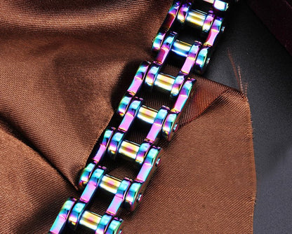 Fuchsia Molly bike chain bracelet with silver-toned links, stylish and durable jewelry accessory on a plain background.