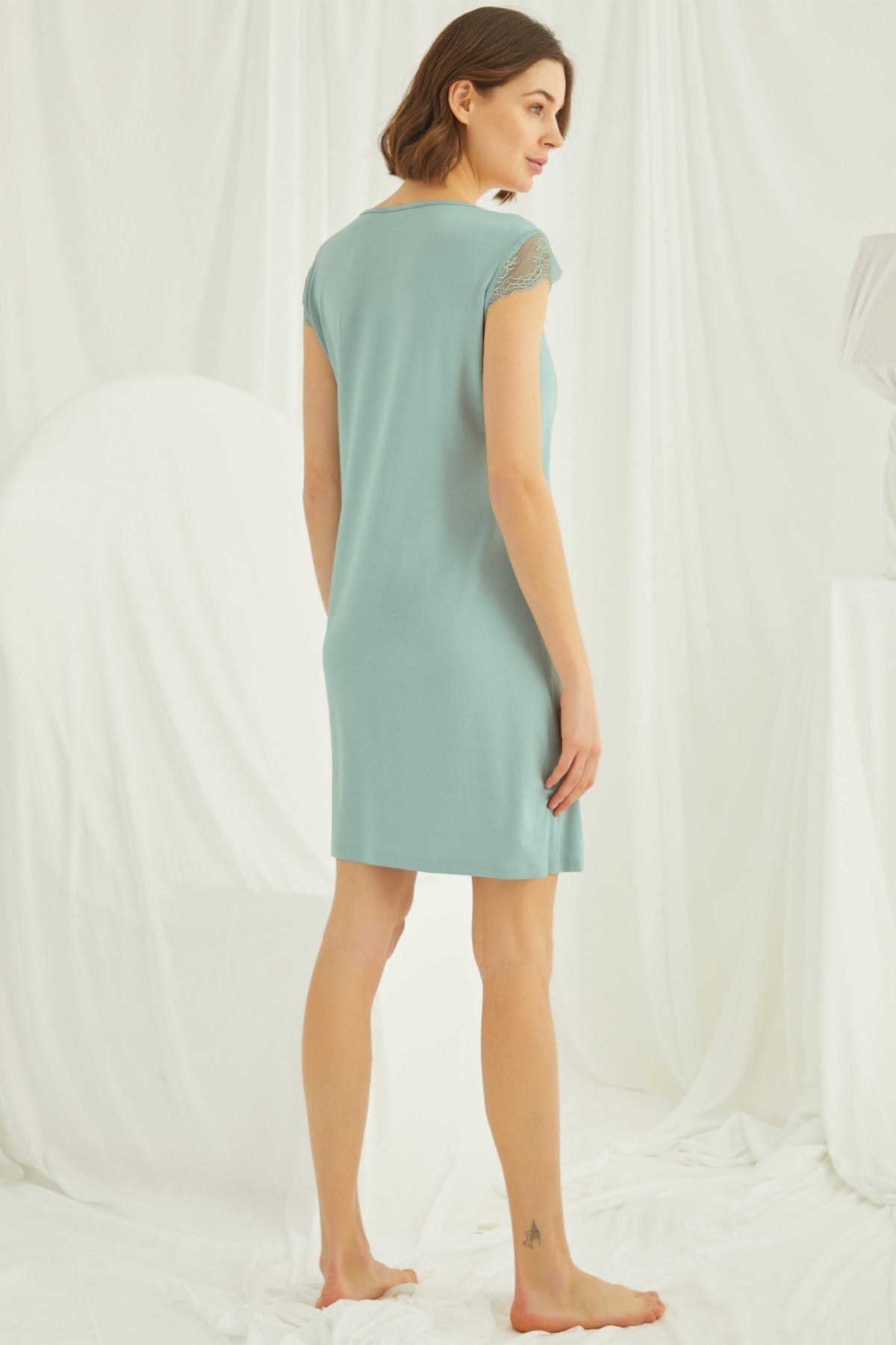 Green lace V-neck maternity and nursing nightgown by Burgundy Artemis, featuring short sleeves and a comfortable fit.