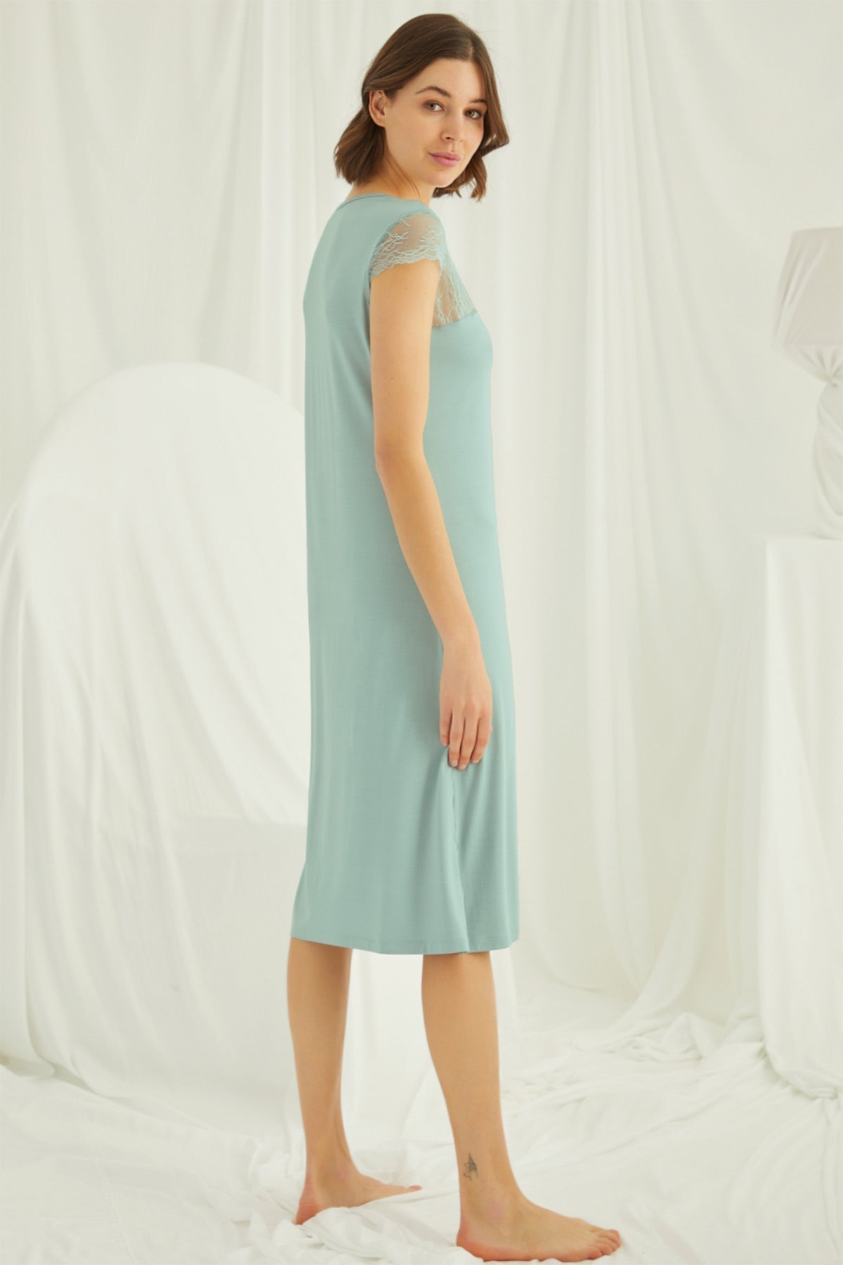 Green Lace V-neck maternity and nursing nightgown by Burgundy Artemis featuring long sleeves and a comfortable, elegant design.