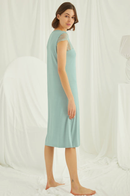 Green Lace V-neck maternity and nursing nightgown by Burgundy Artemis featuring long sleeves and a comfortable, elegant design.
