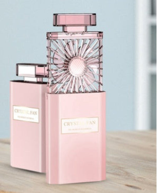Carmine Juneberry portable USB rechargeable perfume fan diffuser with sleek bodycare design and fragrance mist spray.