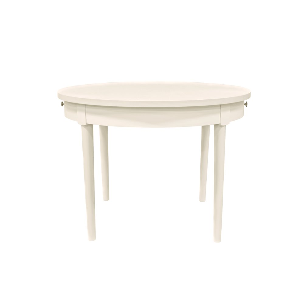 Avery round dining table by Start2Finish with a coconut milk finish, showing smooth wooden surface and modern design.