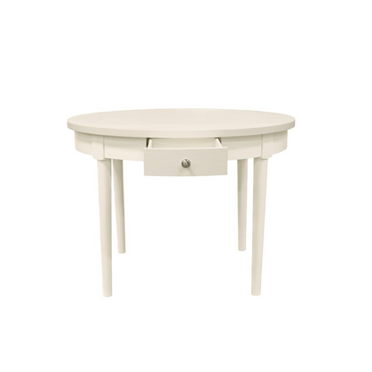 Avery round dining table by Start2Finish with coconut milk finish, showcasing a smooth, polished wooden surface and sturdy legs.