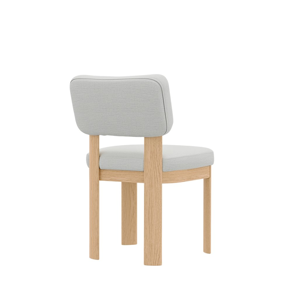 Set of two Gabrielle Side Chairs by Start2Finish with light oak finish, featuring sleek wooden frames and cushioned seats.