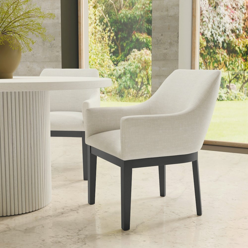 Two Reba Urban Side Chairs by Start2Finish with wooden legs and upholstered seats, shown in a modern furniture setting.