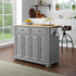 Start2Finish Alexandria wood top kitchen island with storage and wheels, featuring a sturdy wooden surface and modern design.