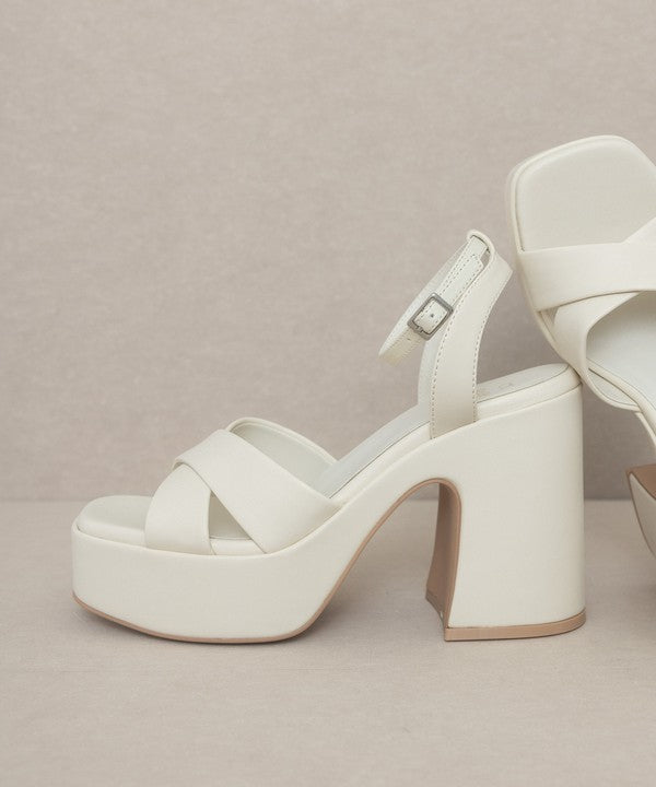 Jade Icarus Oasis Society Norah chunky platform heel in black with thick heel and open toe design.