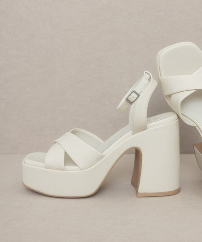 Jade Icarus Oasis Society Norah chunky platform heel in black with thick heel and open toe design.