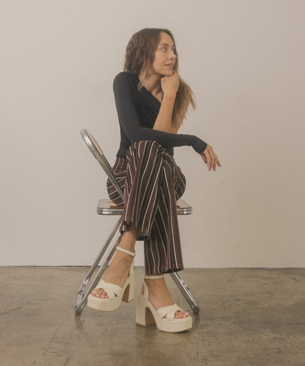 Jade Icarus Oasis Society Norah chunky platform heel shoes with high block heels and stylish design, shown in the product image.