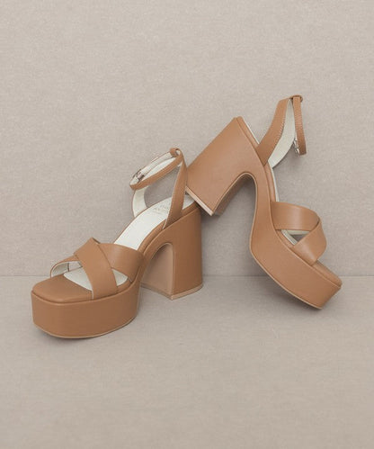 Jade Icarus Oasis Society Norah chunky platform heel in black leather with thick heel and ankle strap on a model&