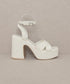Jade Icarus Oasis Society Norah chunky platform heels with thick heel and open toe, black synthetic material.