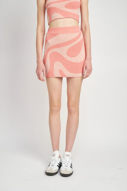 Color blocked mini skirt for women by Jade Icarus, featuring bold geometric patterns in vibrant colors.