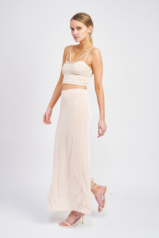 Women’s high waisted maxi skirt by Jade Icarus, flowing fabric, and full length design in a stylish, elegant silhouette.