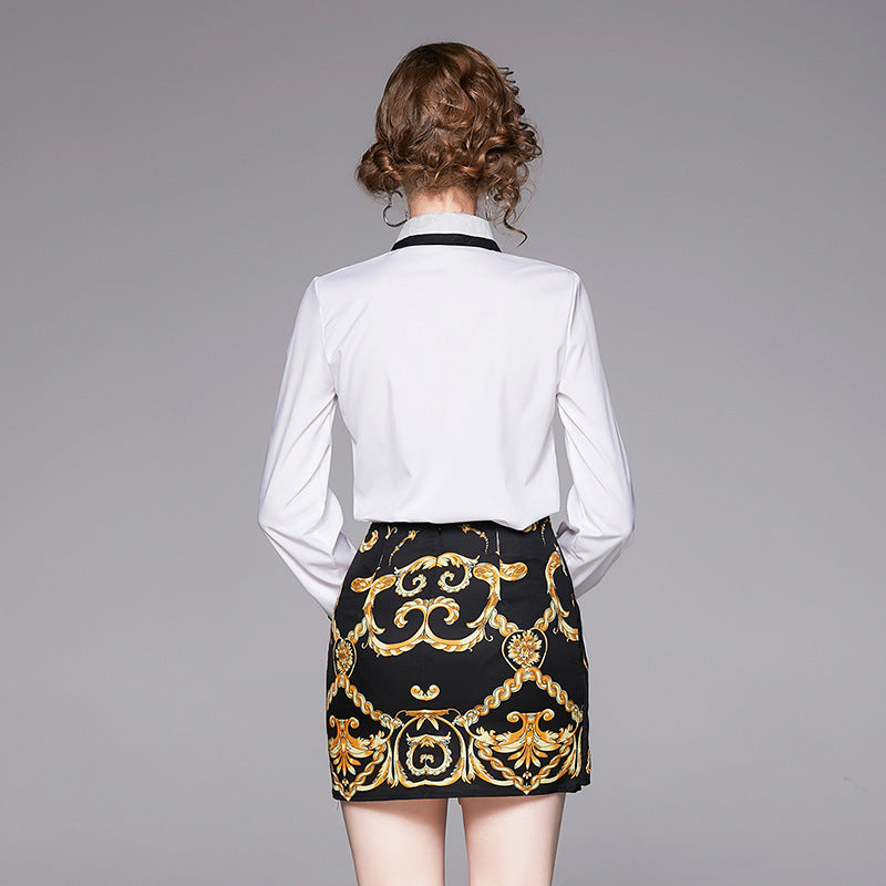 Carmine Juneberry SweetCharm™ matching set with long sleeve top and mini skirt, featuring stylish, coordinated fashion in vibrant fabric.