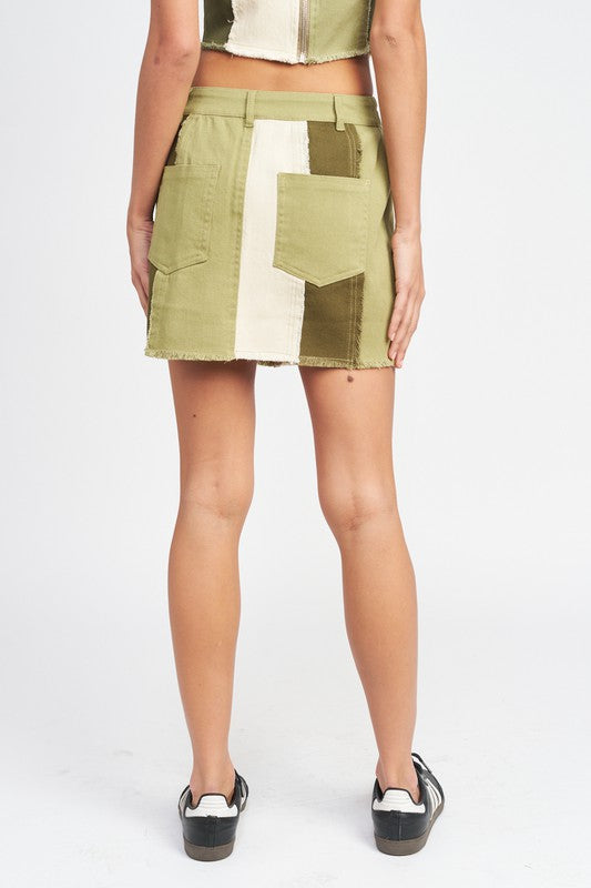 High rise color block skirt from Jade Icarus, featuring bold contrasting panels and a flattering fit for women&