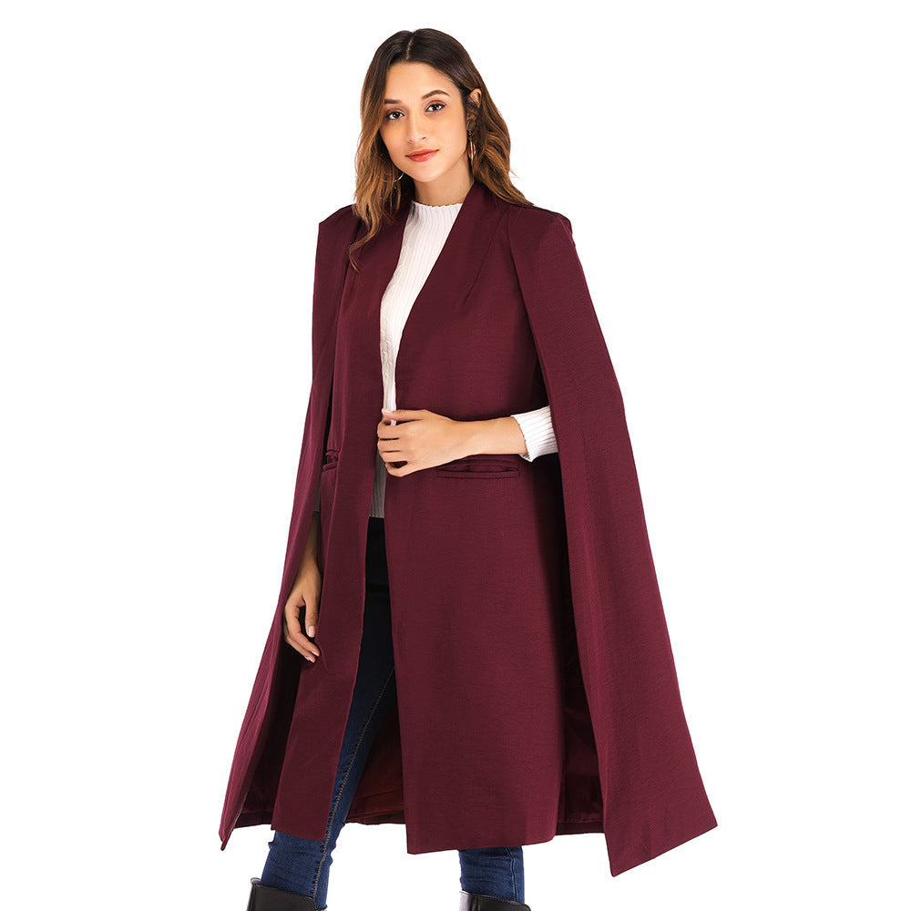 Carmine Juneberry Urban Cloak Cape Coat 25 Edition, stylish black jacket with a flowing cape design, full front view.