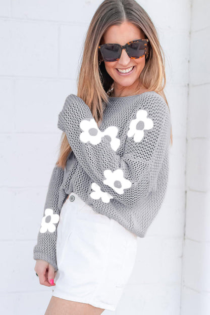 Light grey Big Flower hollowed knit drop shoulder sweater by Carmine Juneberry featuring floral patterns and cozy knit texture.