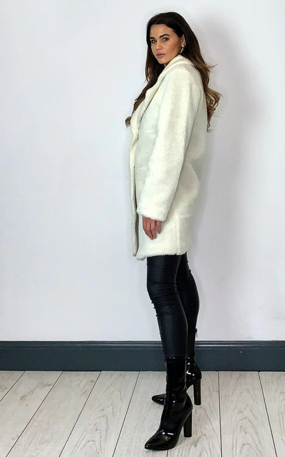 Cream Rose Eleusis Stud Button Borg Teddy Coat, a cozy jacket with stud buttons and plush borg fabric, perfect for cold weather.