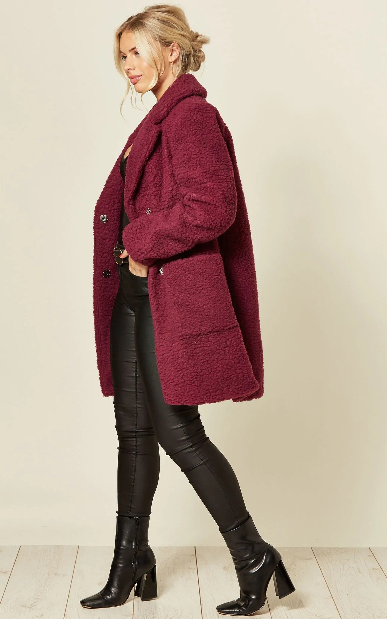 Rose Eleusis stud button borg teddy coat in fuchsia, showcasing plush fabric, button details, and cozy oversized style.