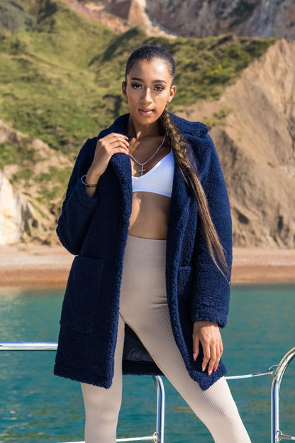 Navy Rose Eleusis Borg Teddy Coat with stud button details, cozy jacket featuring plush exterior and warm lining.