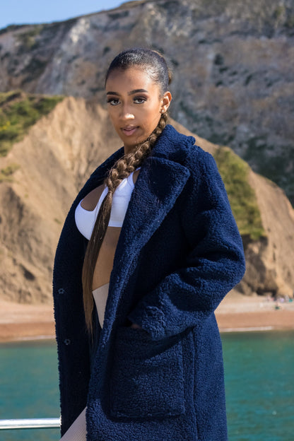 Navy Rose Eleusis Stud Button Borg Teddy Coat with plush lining and button details, perfect for cozy winter wear.