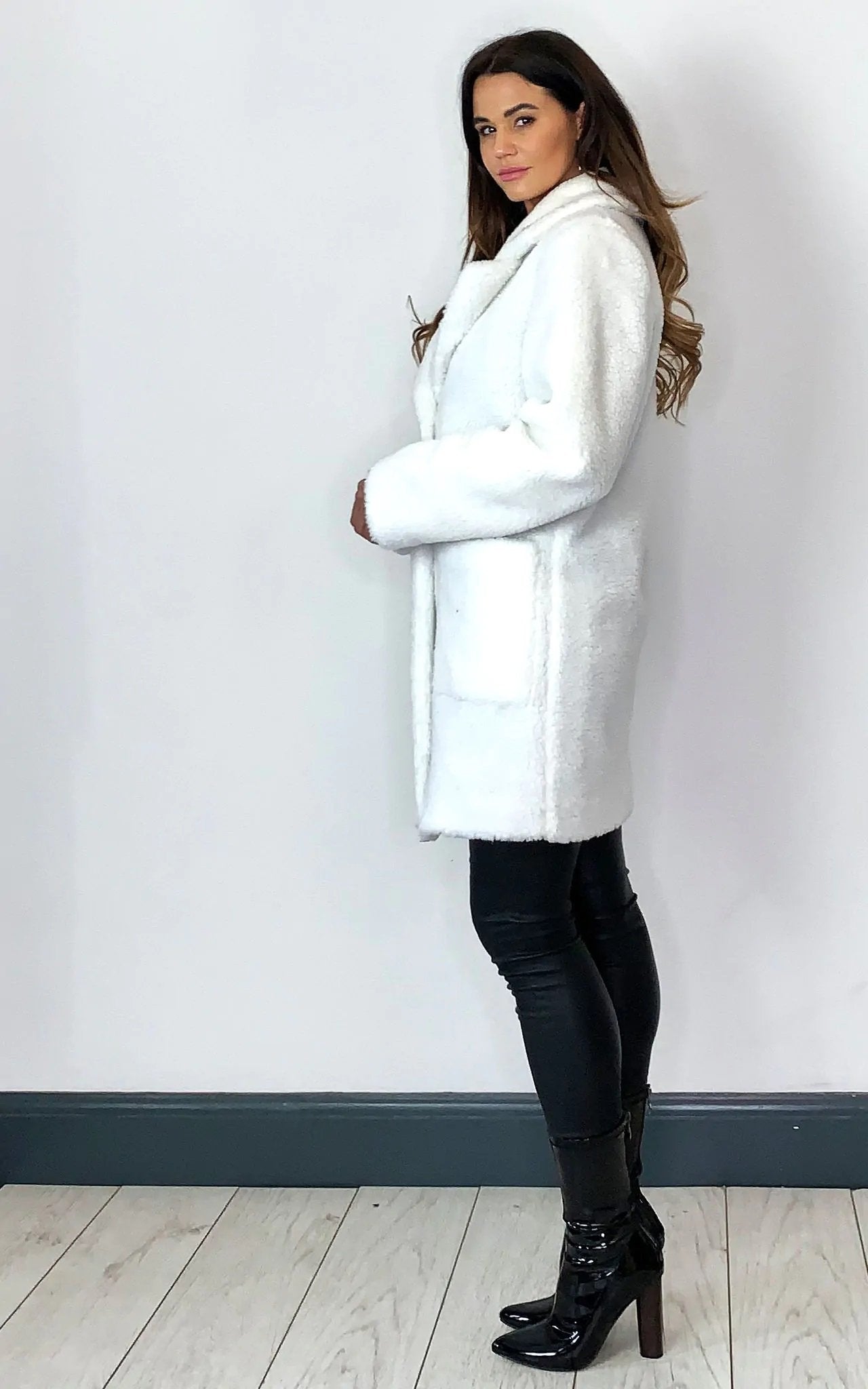 White Rose Eleusis Stud Button Borg Teddy Coat, cozy jacket with button details and plush borg fabric, perfect for cold weather.