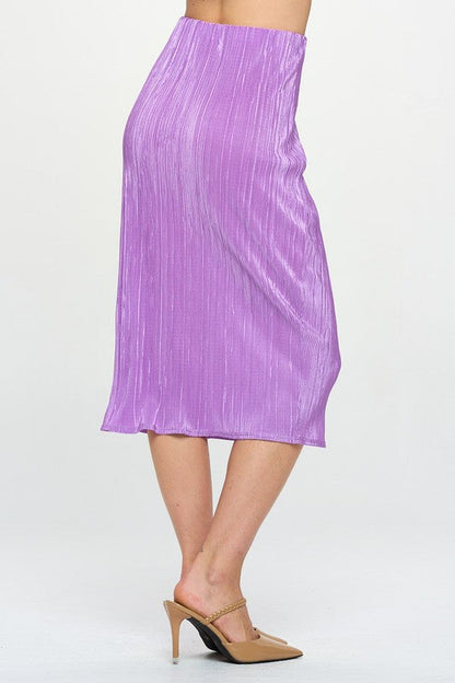 Vibrant plisse midi skirt by Jade Icarus, made in the USA, featuring colorful pleated fabric and a stylish, flowing design.