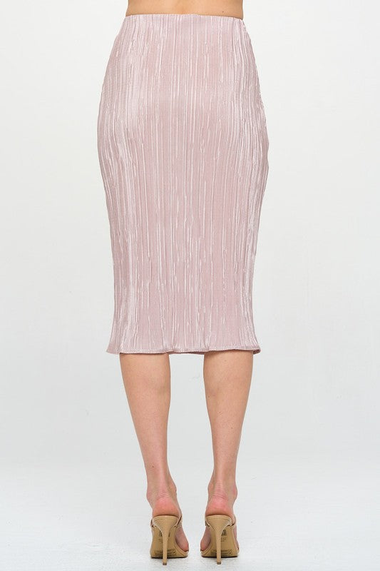 Jade Icarus Made in USA solid plisse midi skirt, showcasing lightweight fabric and elegant pleats on a scenic outdoor background.