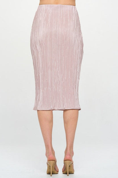 Jade Icarus Made in USA solid plisse midi skirt, showcasing lightweight fabric and elegant pleats on a scenic outdoor background.