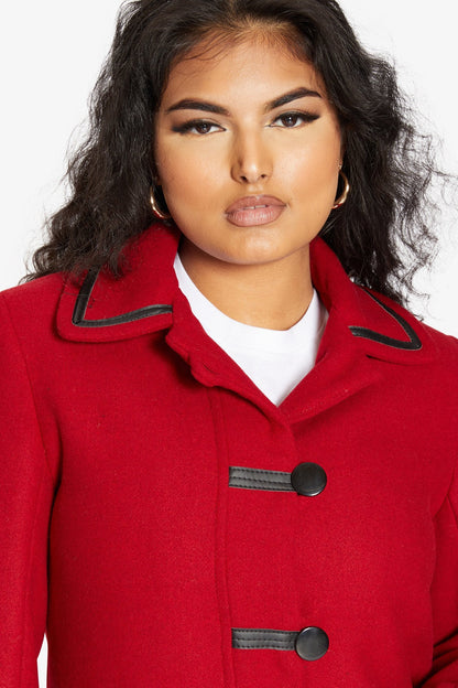Rose Eleusis wool blend coat with contrast trim, stylish 1920s-inspired jacket featuring tailored fit and vintage design details.