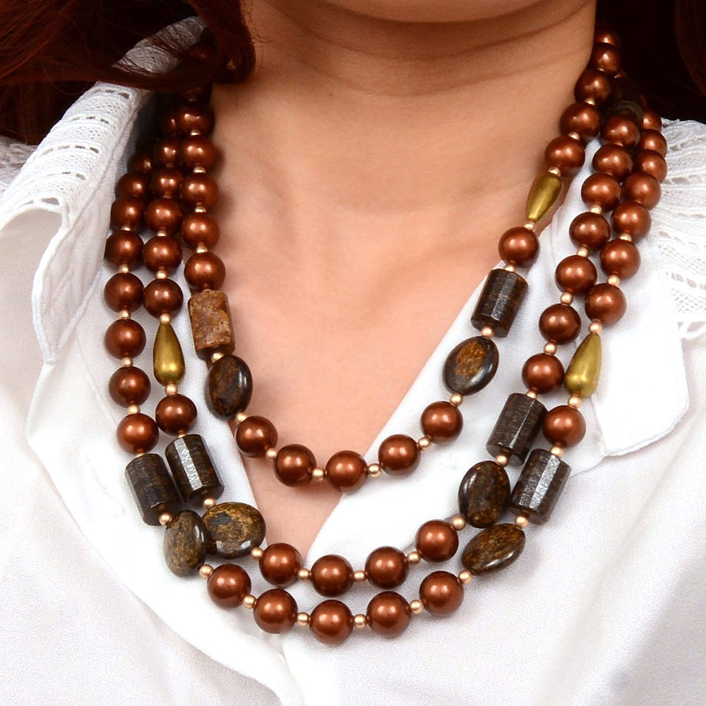 Mocha brown pearl and gold statement necklace featuring large pearls and intricate gold accents, designed by Start2Finish.