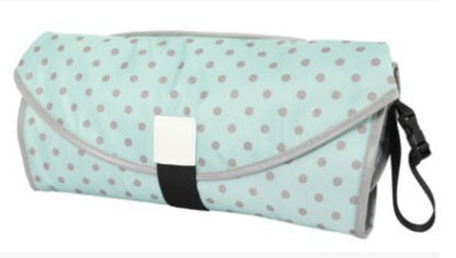 Soft, portable CJDropshipping baby changing pad with cushioned surface for comfortable diaper changes for infants.