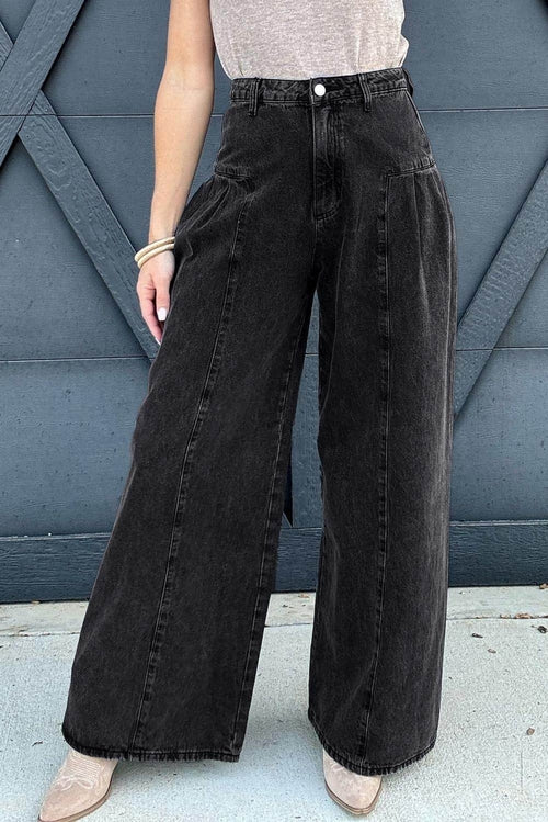 Dark grey pleated wide-leg denim pants by Carmine Juneberry featuring mineral wash and stylish flowy design.