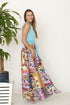 Sleeveless handkerchief woven maxi dress by Jade Icarus featuring flowing fabric and a relaxed fit for women&