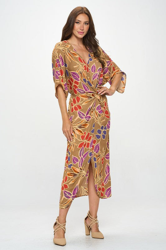 Leaf print kimono dress with front twist by Jade Icarus, featuring flowing fabric and botanical design.