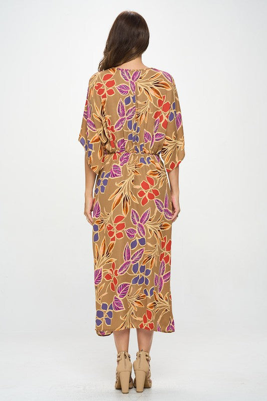 Automotive Jade Icarus leaf print kimono dress with front twist, showcasing lightweight fabric and stylish floral design.