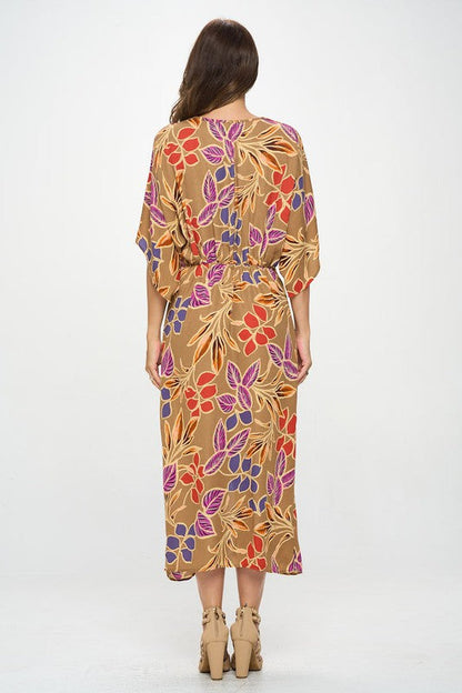 Automotive Jade Icarus leaf print kimono dress with front twist, showcasing lightweight fabric and stylish floral design.