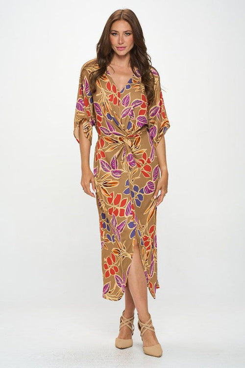 Leaf print Kimono dress with front twist by Jade Icarus, featuring a flowing fabric and botanical leaf pattern.