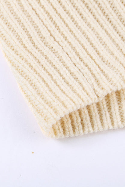 Beige wrap V-neck sweater with side tie from Harlequin Daisy, perfect for cozy bath and beauty lounging.
