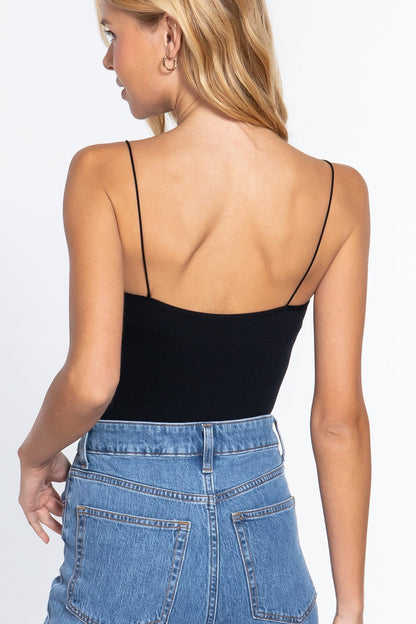 Seamless ribbed round neck cami bodysuit by Jade Icarus, designed for active wear, in a soft, fitted fabric.