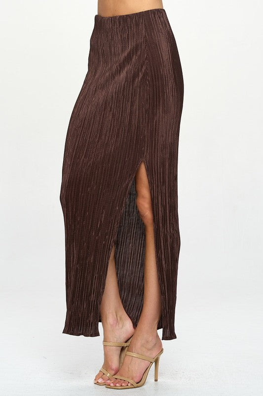 Jade Icarus Made in USA plisse maxi skirt with slit, showcasing flowing fabric and stylish design.