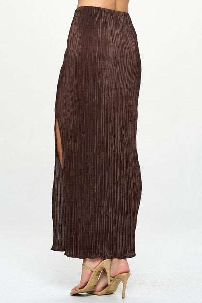 Made in USA Jade Icarus plisse maxi skirt with slit, featuring a flowing fabric and stylish design, displayed on a mannequin.
