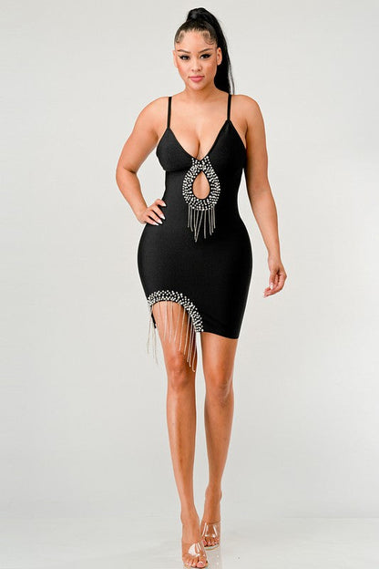 Jade Icarus show-stopping bandage mini dress for women, form-fitting with bold design, shown on a model.