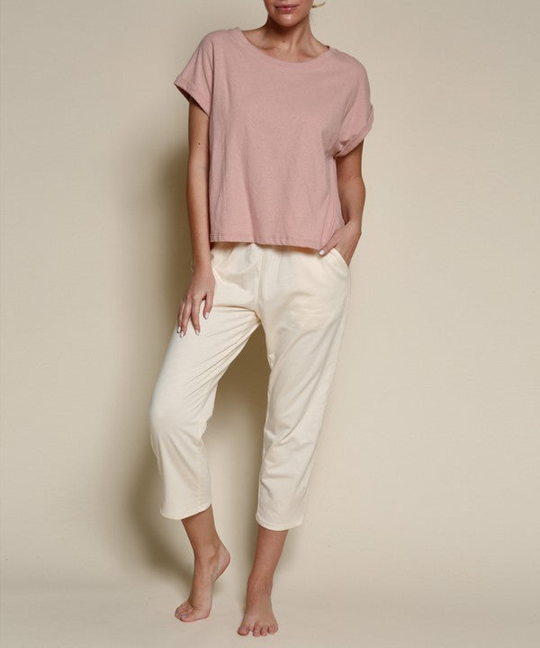 Recycled cotton plain crop top for women by Jade Icarus, featuring a simple, stylish design in natural fabric.