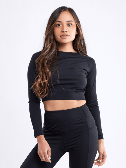 Black Lavender JupiterGear long-sleeve crop top for activewear, shown in a stylish black color with fitted design.